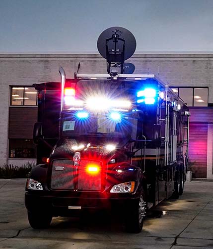 Washtenaw County Sheriff Mobile Command Unit with flashing emergency lights
