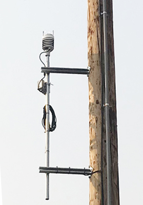 Orion weather station mounted on power pole
