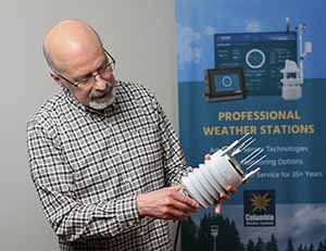 CWS President Nader Khoury holding an Orion sensor.