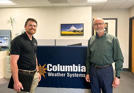 John and CWS President Nader at the office.