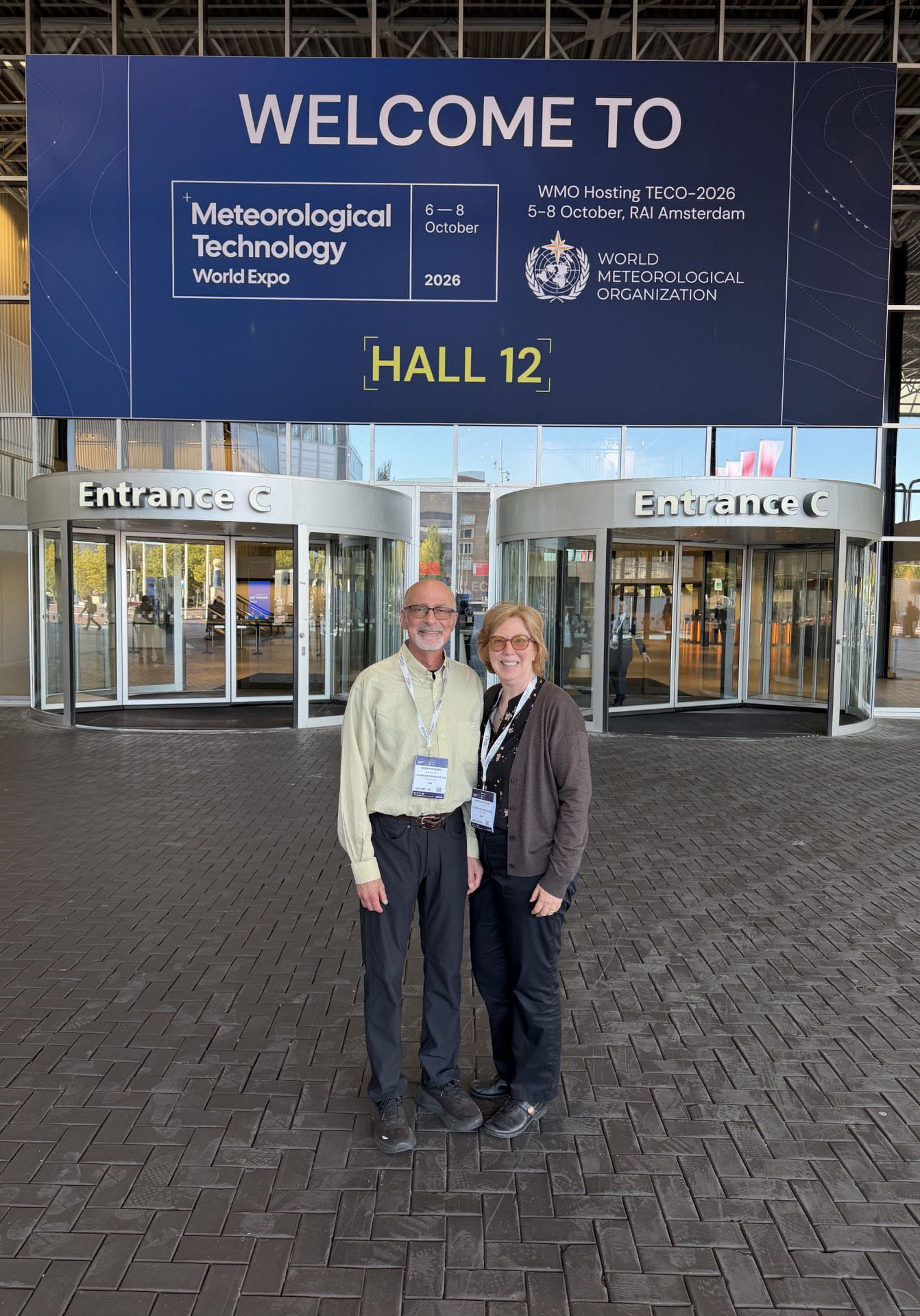 Martha in front of the Met Tech 2026 building in Amsterdam