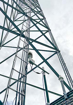 Orion weather station mounted on a communication tower.