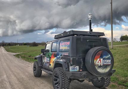 Storm Tracker Jeep with Magellan MX600 Weather Station on roof