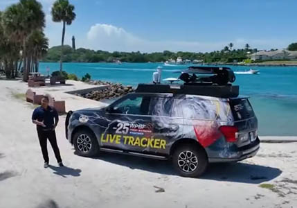 News Weather Tracker vehicle with weather station mounted on roof.