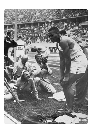 Archie Williams gets interviewed after winning gold at the 1936 Berlin Olympics
